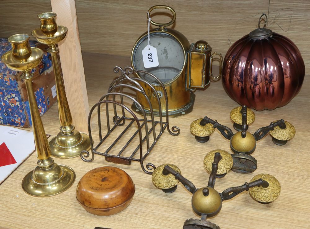 A 19th century brass ships compass, a pair of brass candlesticks, a three branch wall sconces and a tree candleholder, etc.